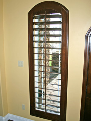 Window Treatments. This is an image of Wood Plantation Shutters. | Carpet Station sells Plantation Shutter Window Treatments. 